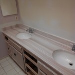 New vanity top installed and drywall repair complete